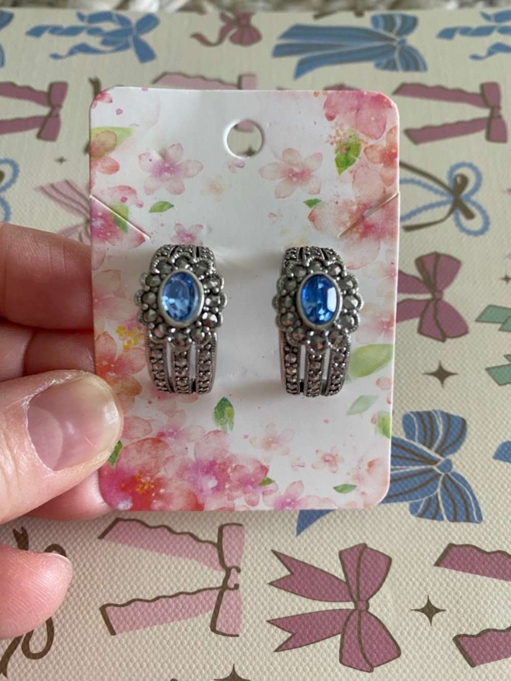 Avon Silver-Tone Earrings with Blue Crystal Accent